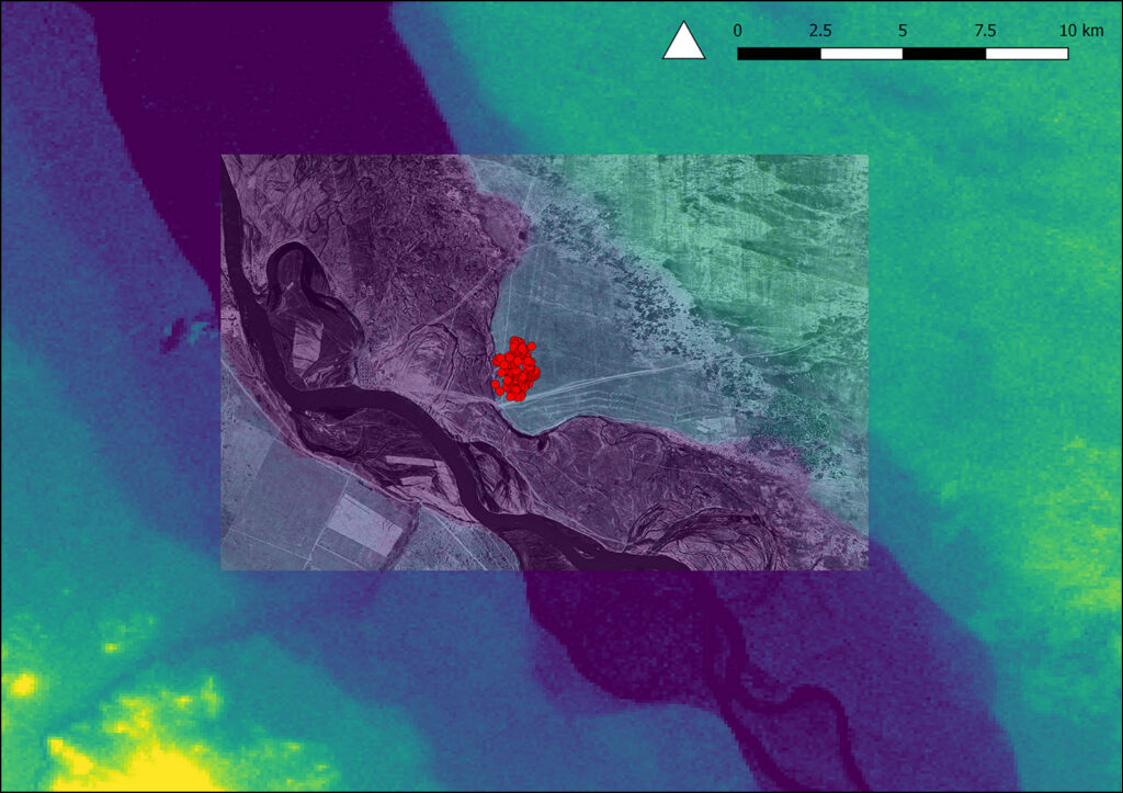 A color-coded elevation map showing a river valley
