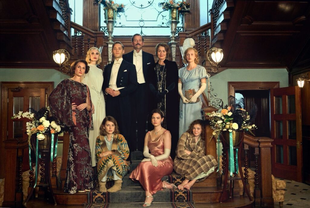 Aristocratic Family photo circa 1930s with everyone lined up along the grand staircase