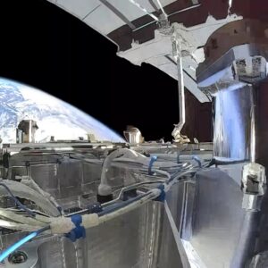 Image of a satellite in space and the Earth in the background.