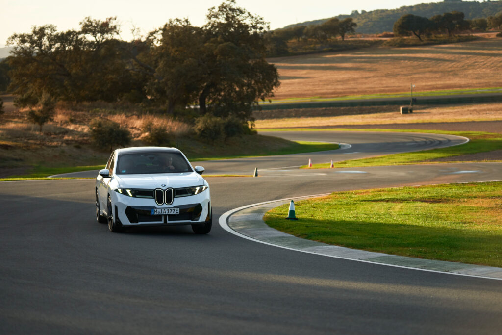 A BMW iX3 on track