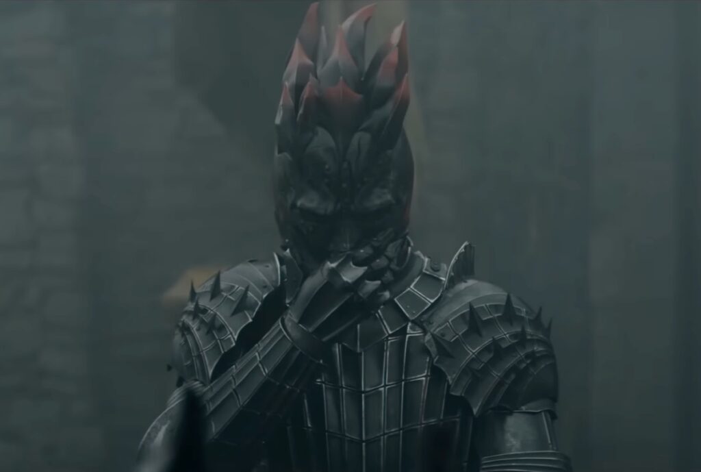 knight in black armor looking ominous