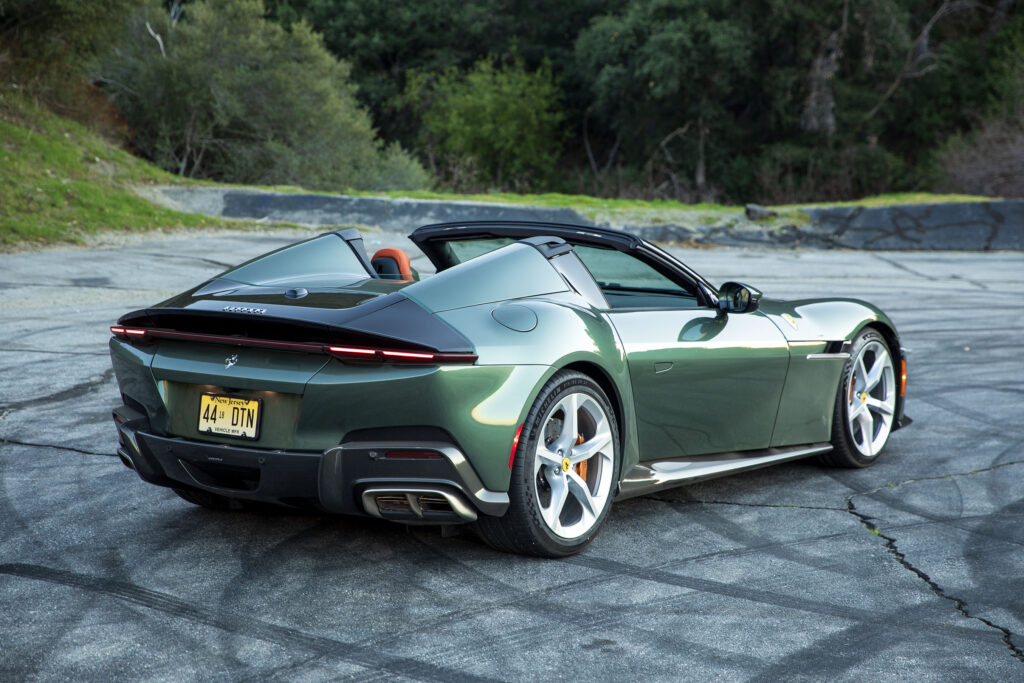 A green Ferrari 12Cilindri seen from behind.