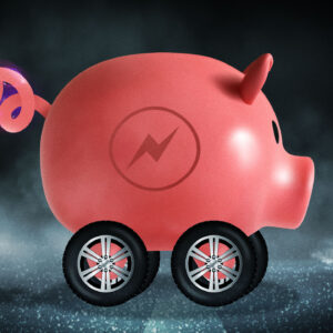 A piggy bank with wheels and an electricity sign on its flank