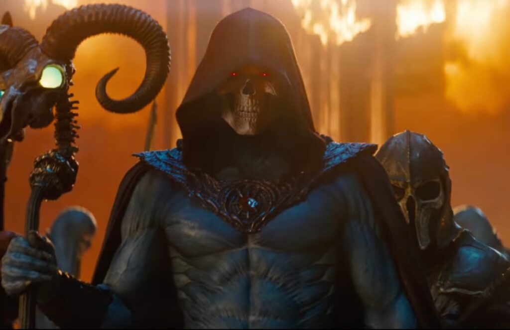 Hooded figure all in black, holding a scythe, with a sfull face and glowing red eyes