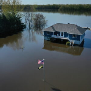 A house in a flooded field
