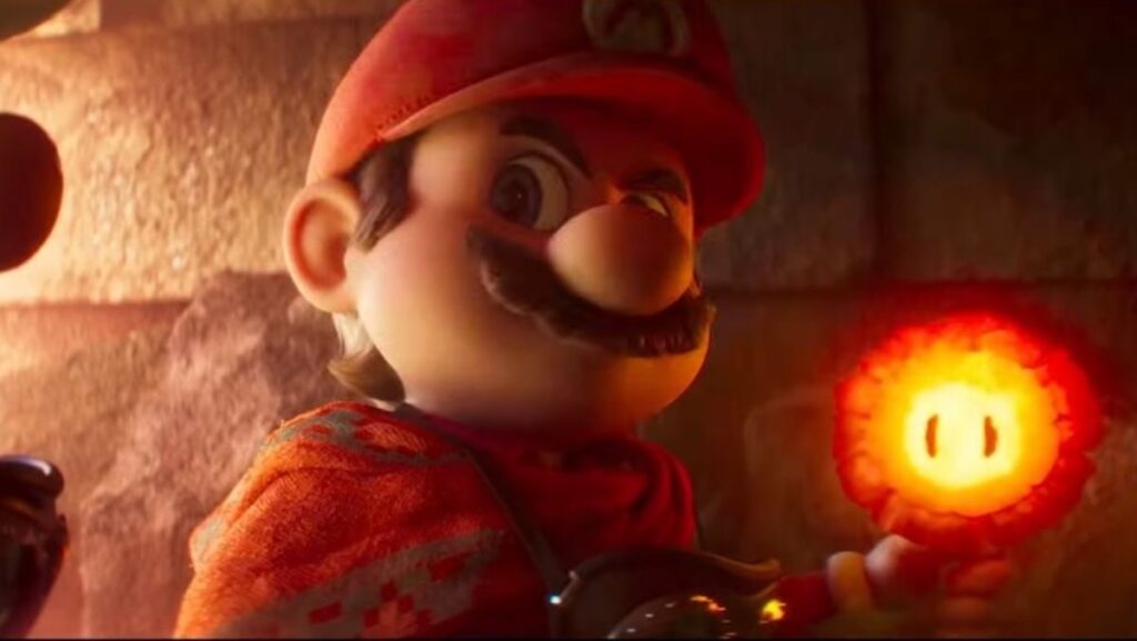 cartoon mario brother holding a fireball in one hand.