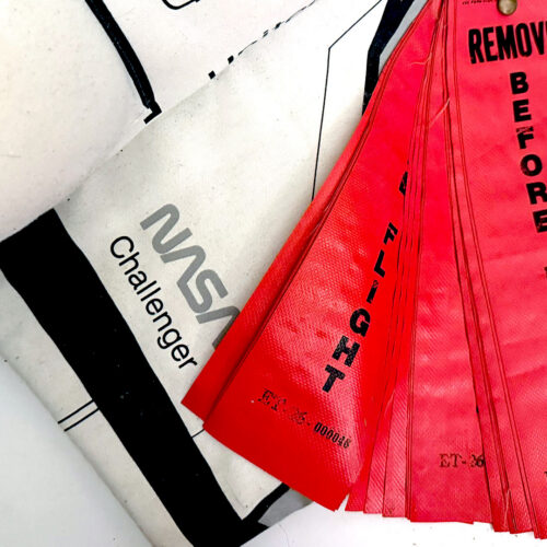 I bought "Remove Before Flight" tags on eBay in 2010—it turns out they're from Challenger