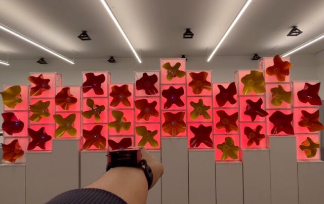 Watch a robot swarm “bloom” like a garden