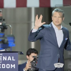 Photo of Pete Hegseth giving the Vulcan salute.