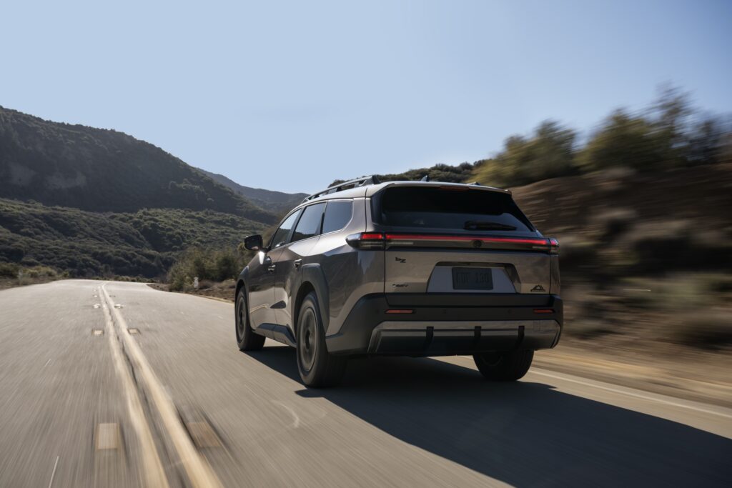 A Toyota bZ Woodland driving away from the camera