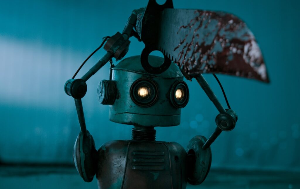 image of a small humanoid robot holding a knife almost as large as itself above its head