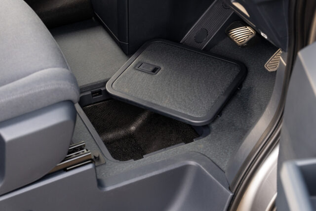 Kia PV5 storage cubby under the floor