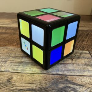 Rubik's WOWCube playing the Rubik's Cube puzzle