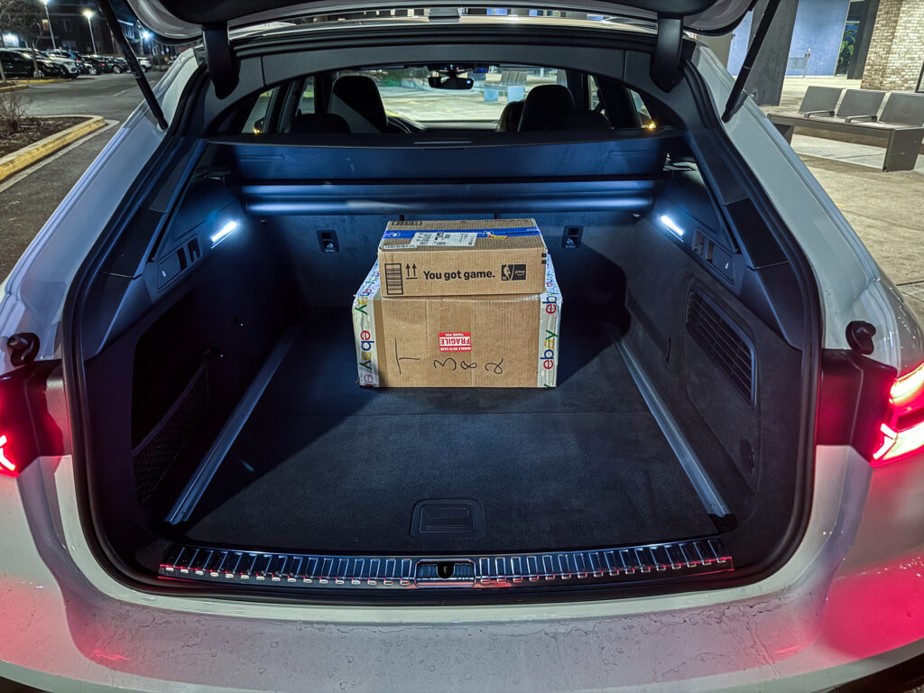 Audi RS6 trunk with a cardboard box