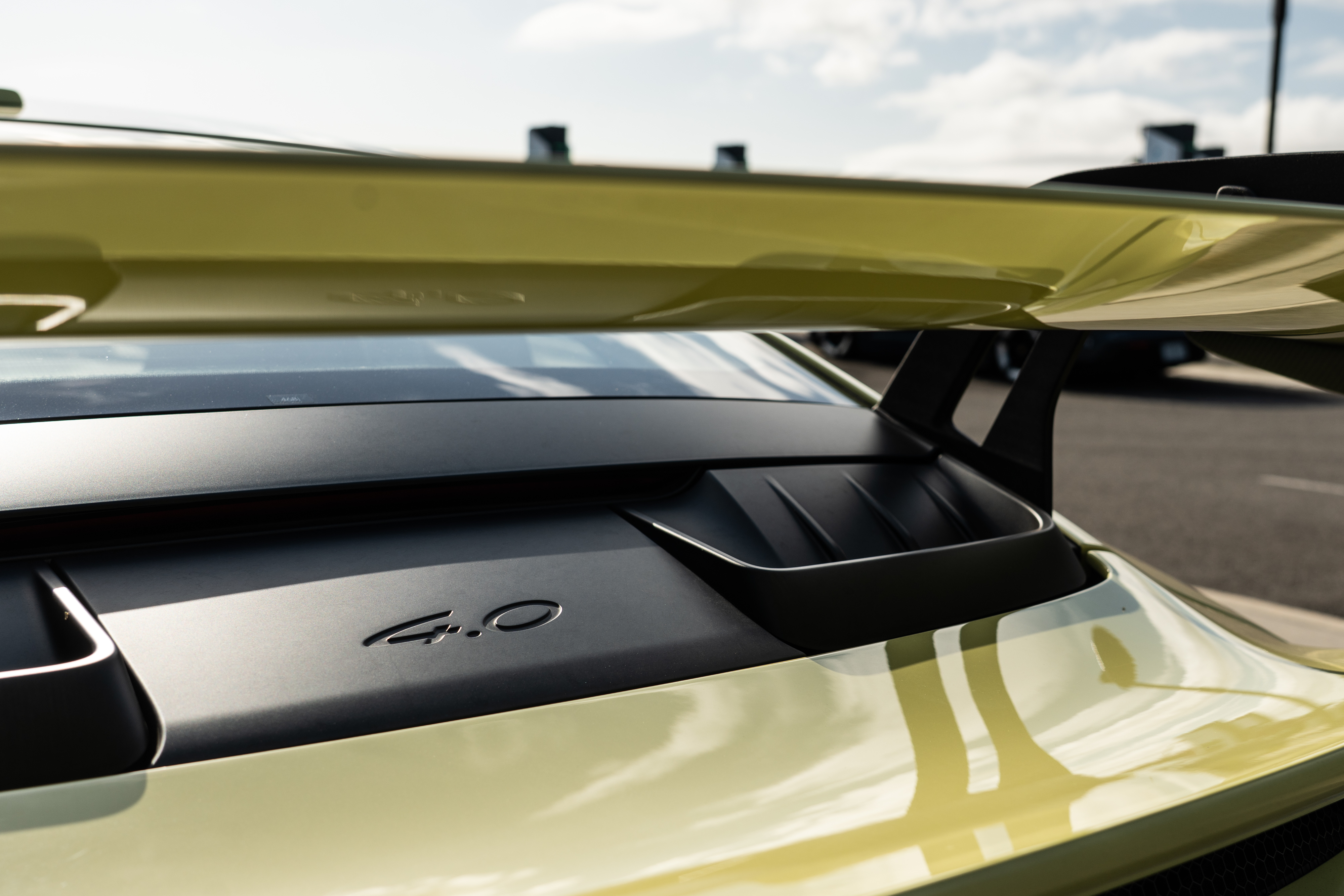 The back of a yellow porsche 911 GT3