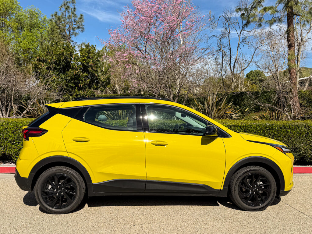 A yellow Chevrolet Bolt in profile