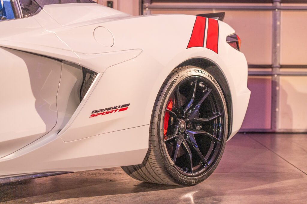 The rear fender of a white corvette