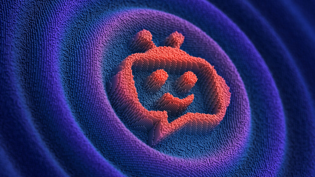 Logo Reddit na ekranie smartfona w kontekście technologicznym