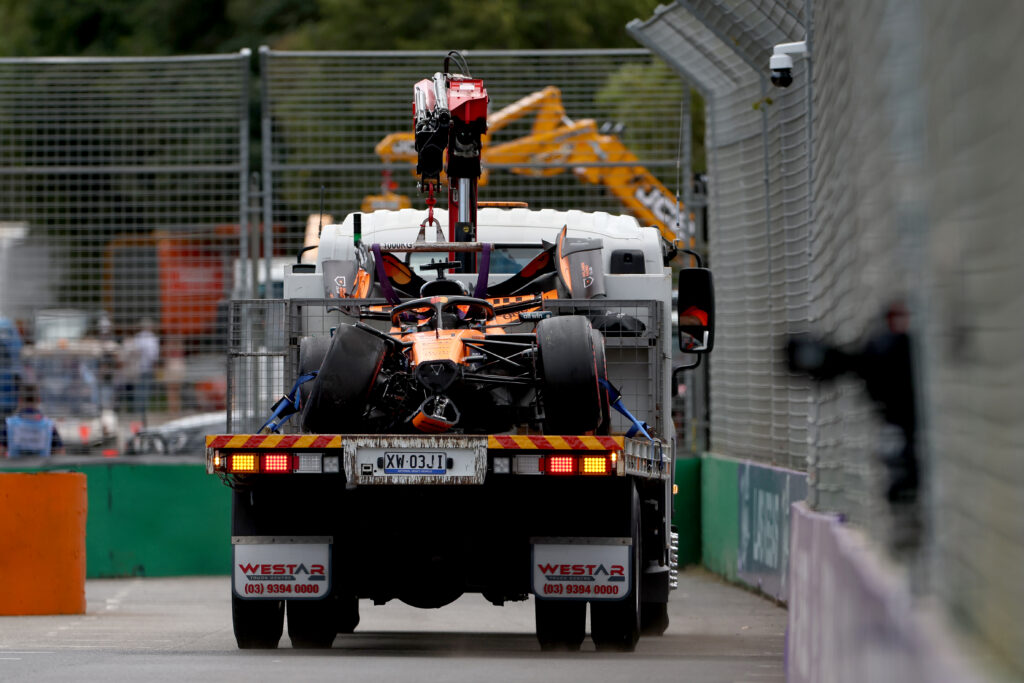 MELBOURNE, AUSTRALIA - MARCH 08: The crashed car of Oscar Piastri of Australia driving the (81) McLaren MCL40 Mercedes is cleared by the marshals during the F1 Grand Prix of Australia at Albert Park Grand Prix Circuit on March 08, 2026 in Melbourne, Australia. (Photo by Dom Gibbons - Formula 1/Formula 1 via Getty Images)