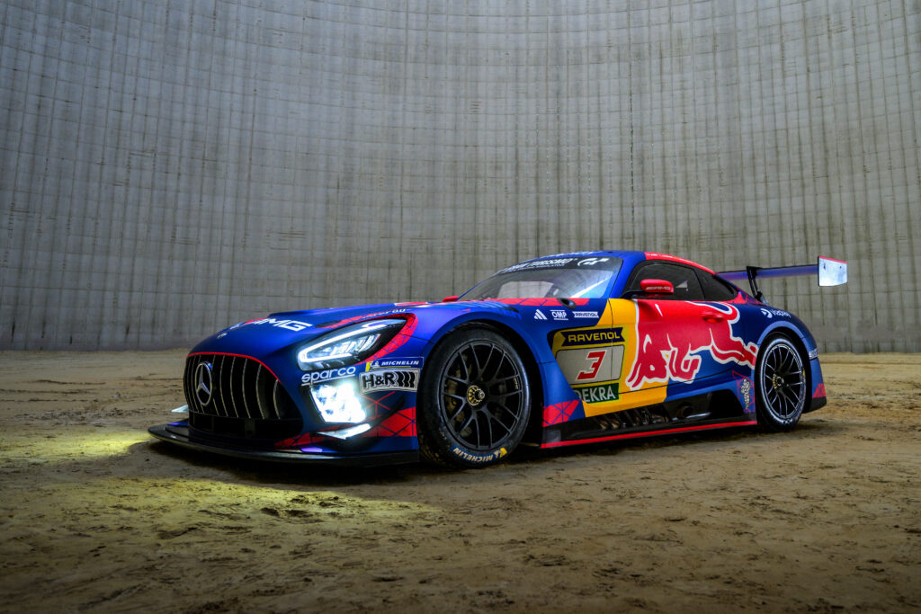 A mercedes-AMG GT3 race car inside a cooling tower of a power plant