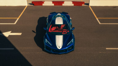 A blue and white Corvette Grand Sport seen from above