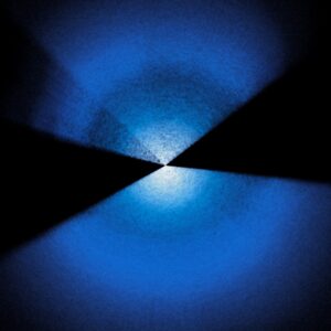 Two fans of blue and white dots extending up and down from center on a black background.