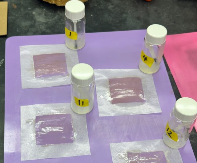 Testing hundreds of possible combinations, the team finally found a small handful of additives that created a clear, electrically conductive nail polish (painted on the squares shown