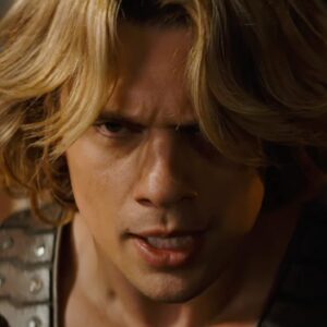 closeup of a young He-Man with a fiercely determined expression on his young face