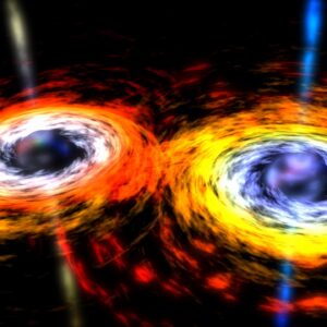 Image of two dark spheres surrounded by bright materail, swirling in towards a collision.