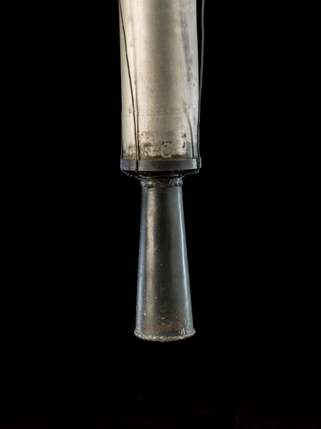 a close-up photo of a small metal rocket nozzle