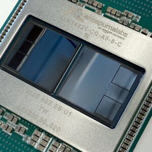 An angled, top-down view of Amazon's Trainium3 chip that is designed to train larger AI models and serve more customers using AI services.