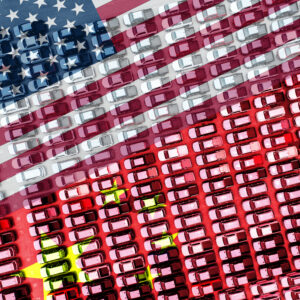 US and Chinese flags superimposed on top of a top-down view of hundreds of cars