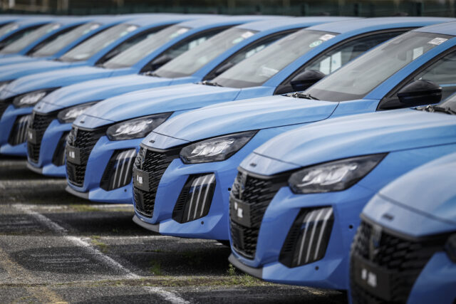 Peugeot cars are seen parked outside the Stellantis multinational car manufacturer's plant in Poissy, west of Paris, on April 15, 2026. Automaker Stellantis will cease automobile production at its historic Poissy plant (Yvelines) after 2028. The site will be converted into a parts manufacturing and vehicle dismantling center, retaining 1,000 of the current 2,000 jobs, the group announced on April 16, 2026. (Photo by Simon Wohlfahrt / AFP via Getty Images)