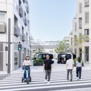 People crossing a street in a modern city
