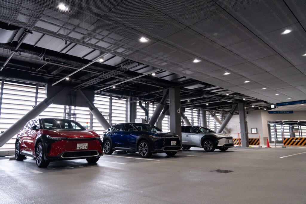 three Toyota EVs parked in a row