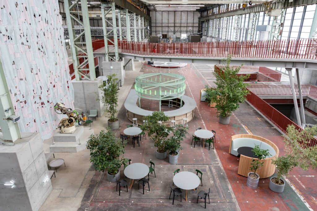 A large open space with some tables and chairs.