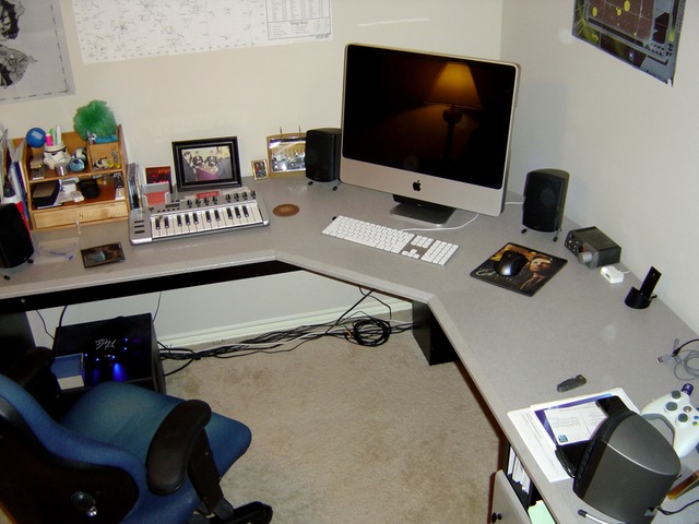 Photograph of Lee's desk showing an iMac