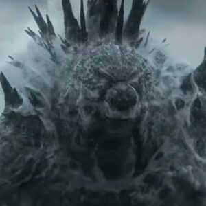 gigantic godzilla monster rising out of the ocean with a great roar