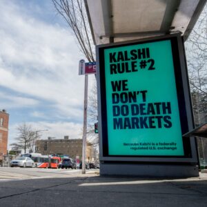 An advertisement at a bus stop says, "Kalshi rule #2: We don't do death markets," and that "Kalshi is a federally regulated US exchange."