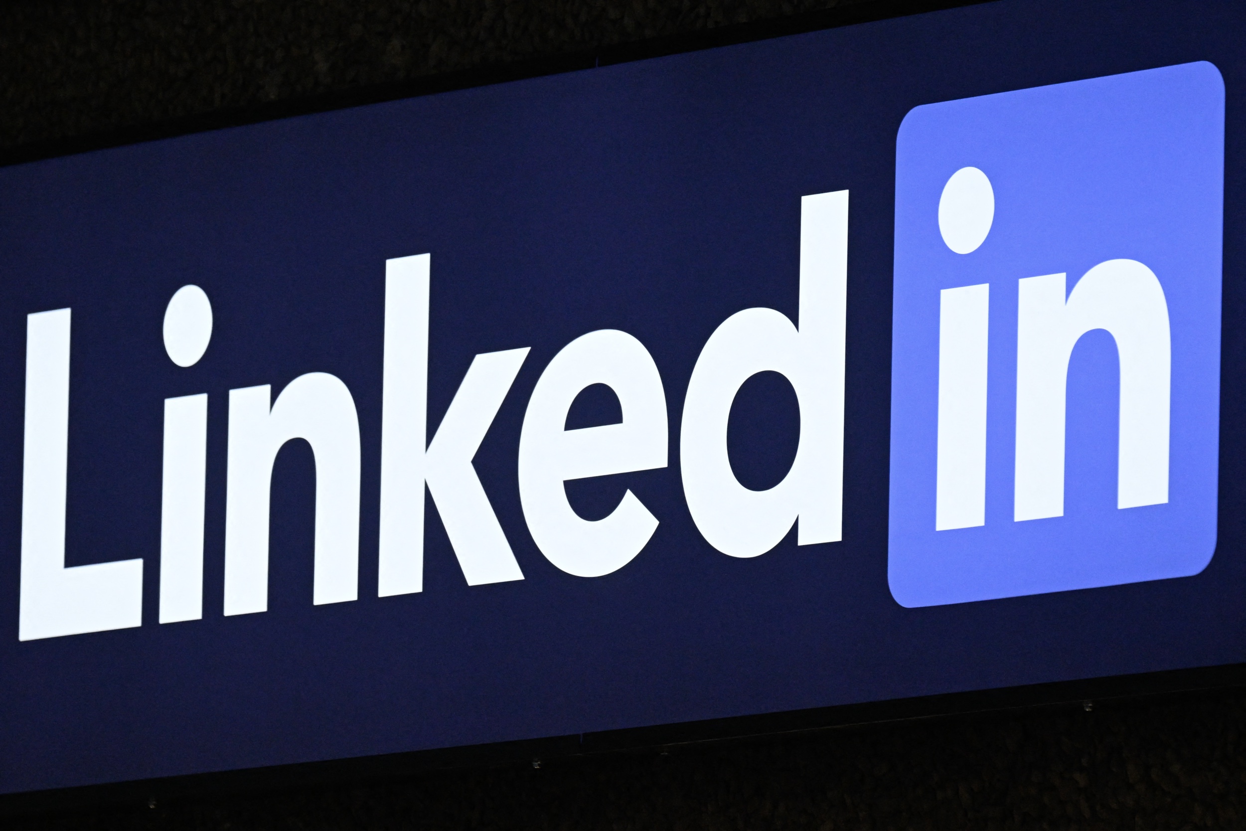 Large LinkedIn logo on a blue background
