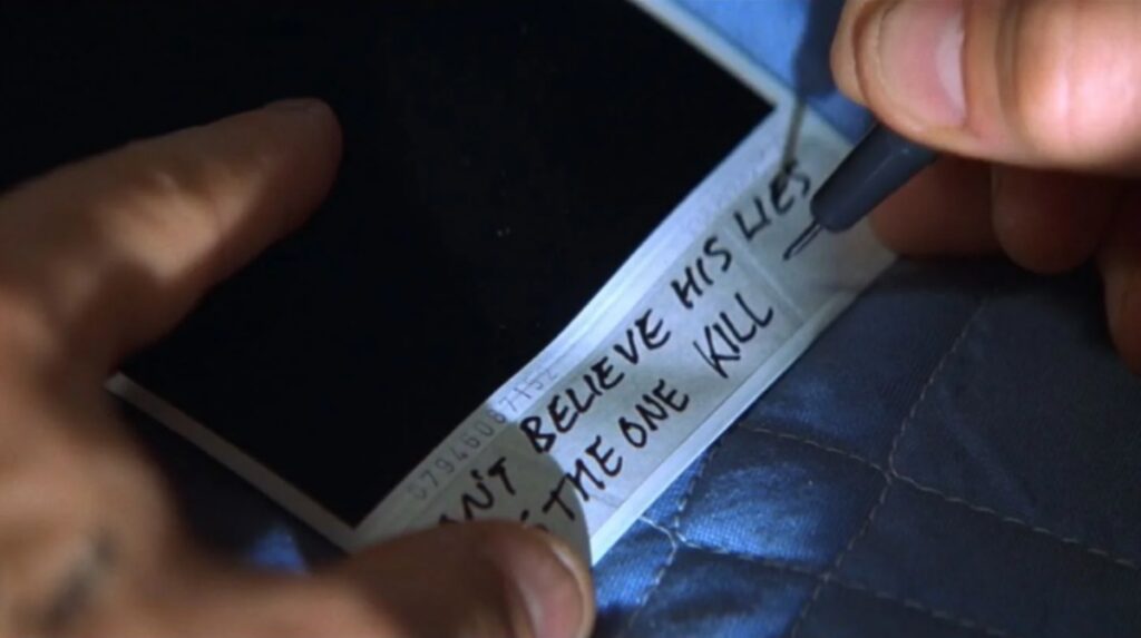 closeup of a poloroid with a note reading 