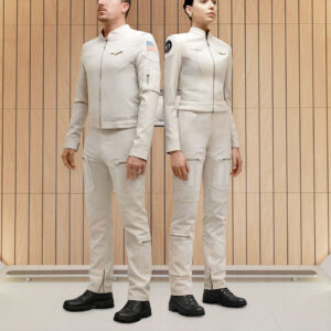 male and female models sport a two-piece white flight suit with hook-and-fastener attach points and pockets.