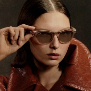 Someone modeling Ray-Ban Meta (Gen 2) smart glasses.