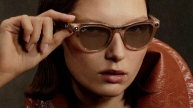 Someone modeling Ray-Ban Meta (Gen 2) smart glasses.