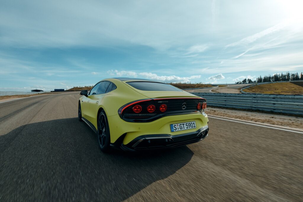 A mercedes-AMG GT 63 4-Door Coupe driving away from the camera on track