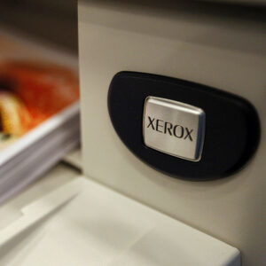 The Xerox logo is displayed on a printer