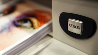 The Xerox logo is displayed on a printer