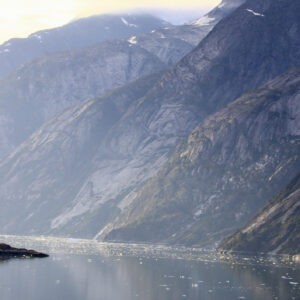 Image of a narrow strait surrounded by tall mountains.