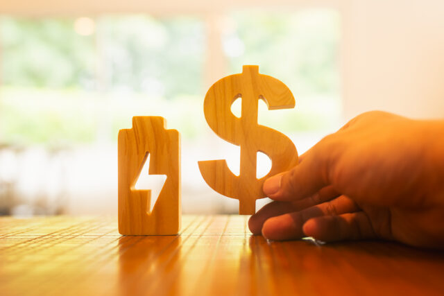 Dollar symbol with electricity symbol. concept of household utilities expenses monthly electricity bill more expensive electricity bills.