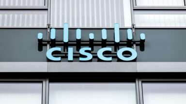 The Cisco Systems, Inc. logo and lettering can be seen on the Cisco Systems GmbH headquarters building in Garching, Germany